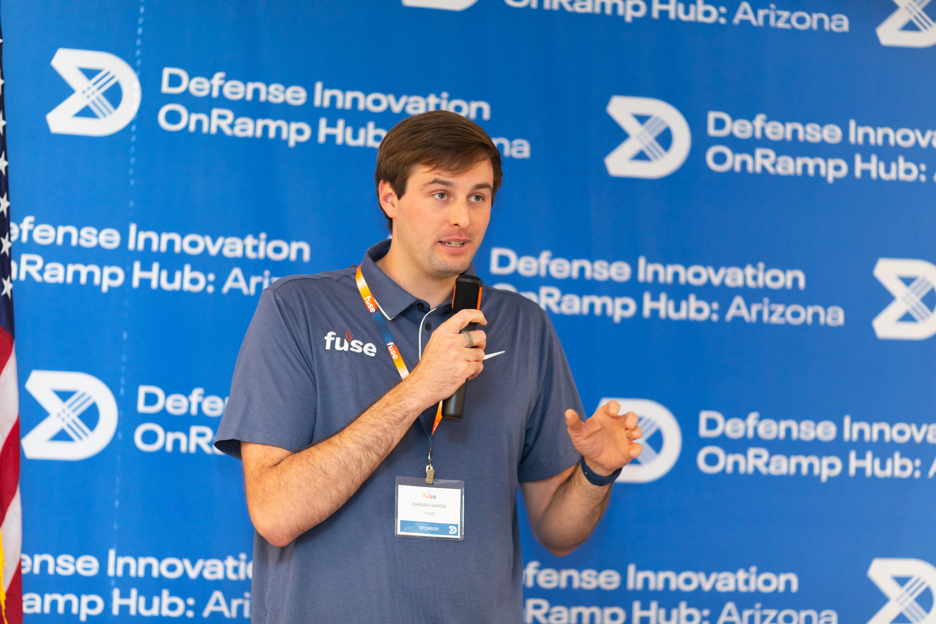 Fuse sponsor speaking at an Arizona Defense event