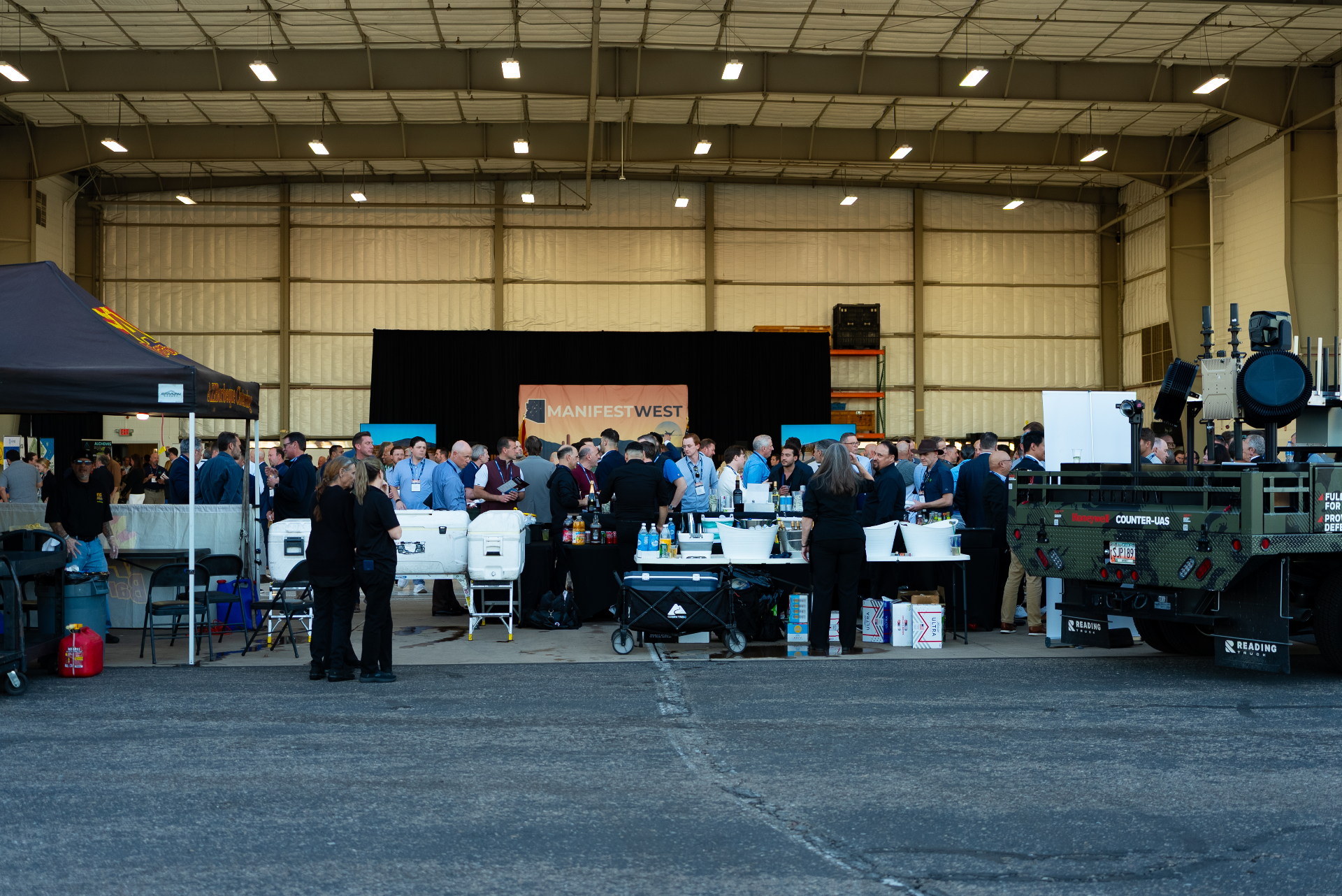 Hangar reception with Manifest West backdrop